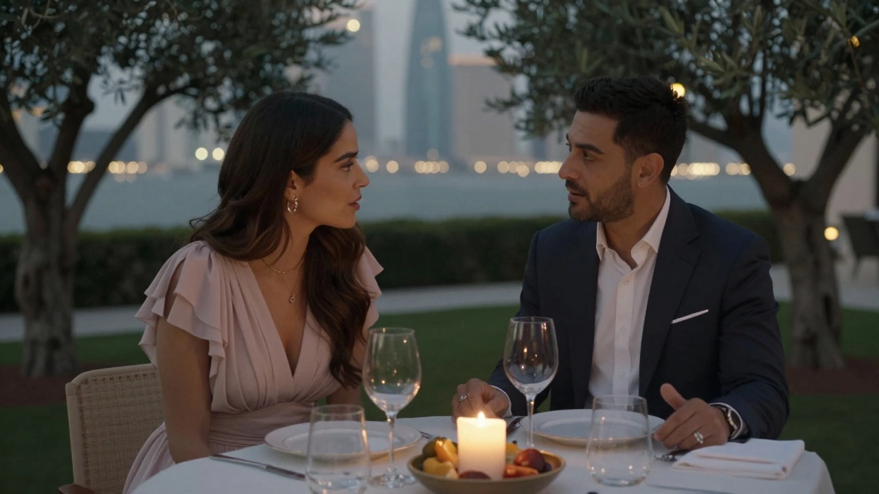 A man and woman share a quiet dinner in a private villa garden, candlelight illuminating their thoughtful conversation.